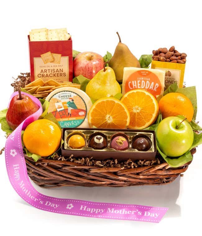 Fresh fruit and gourmet Mother&rsquo;s Day gift basket with pears, apples, oranges, cheddar and gouda cheese, roasted almonds, olive oil &amp; sea salt crackers, and assorted chocolates with a Happy Mother&rsquo;s Day ribbon.
