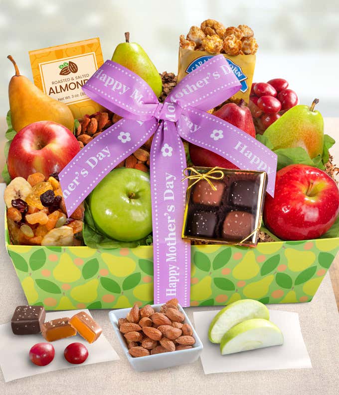 Gift basket with red & Green pears, red & Green apples, roasted & salted almonds, cherry berry nut trail mix, chocolate cherries, caramel popcorn, and vanilla caramels in a gift basket with a Happy Mother's Day Ribbon