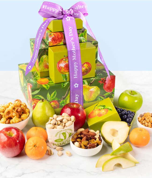 Gift tower with red &amp; green apples, mandarins, butter toffee peanuts, green pear, chocolate blueberries, and caramel popcorn with a Happy Mother's Day ribbon