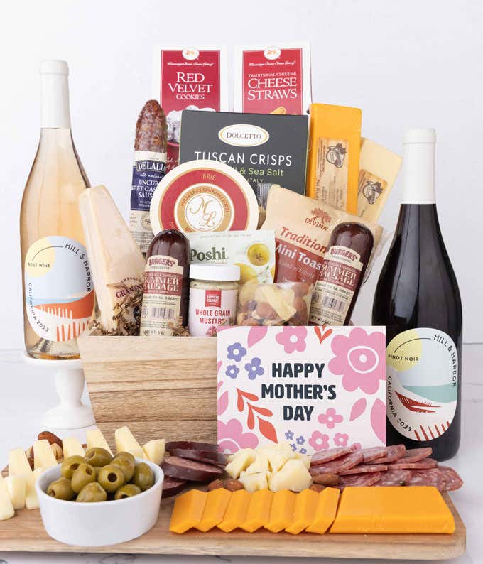 Mother’s Day charcuterie crate with Hill & Harbor Rosé and Pinot Noir, artisan salami and sausage, cheeses, olives, Tuscan crisps, cookies, and savory snacks, arranged with sliced meats, cheeses, and floral card.